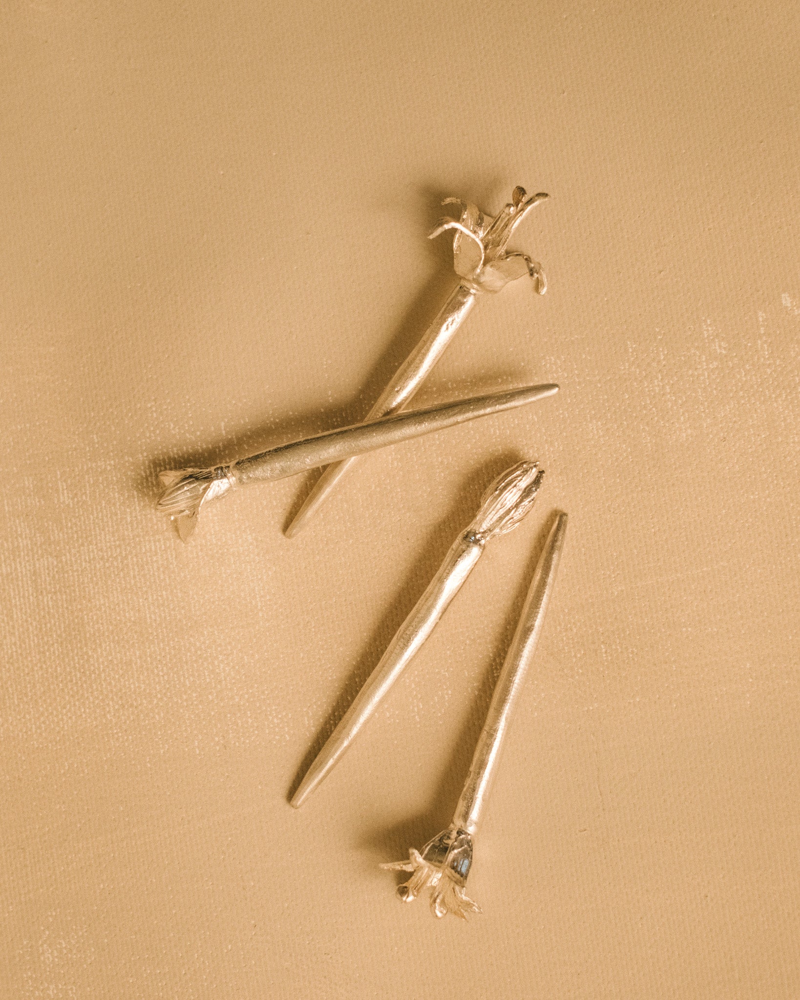 Yeodong Yun Dessert Picks, set of four handmade sculptural silver picks with flower tops at different stages of bloom