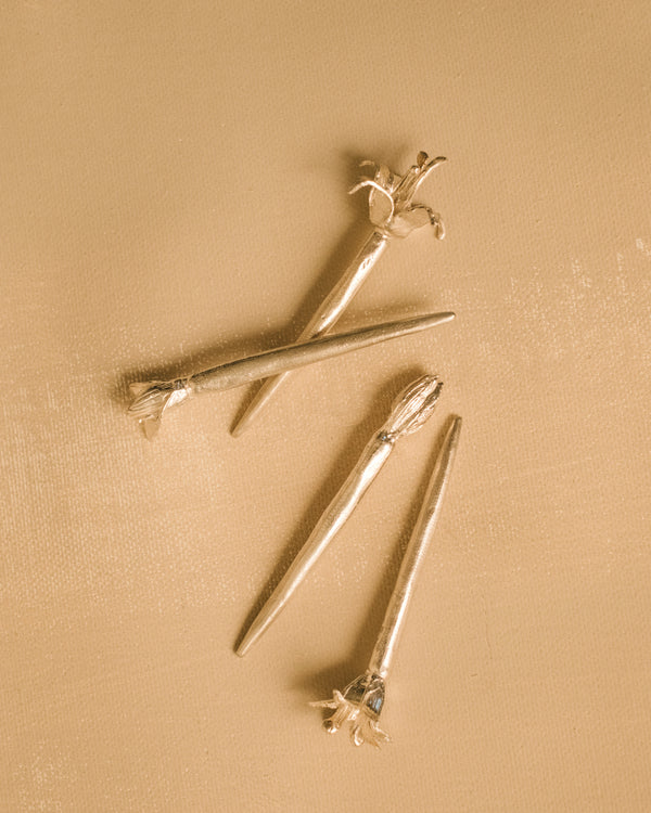 Yeodong Yun Dessert Picks, set of four handmade sculptural silver picks with flower tops at different stages of bloom