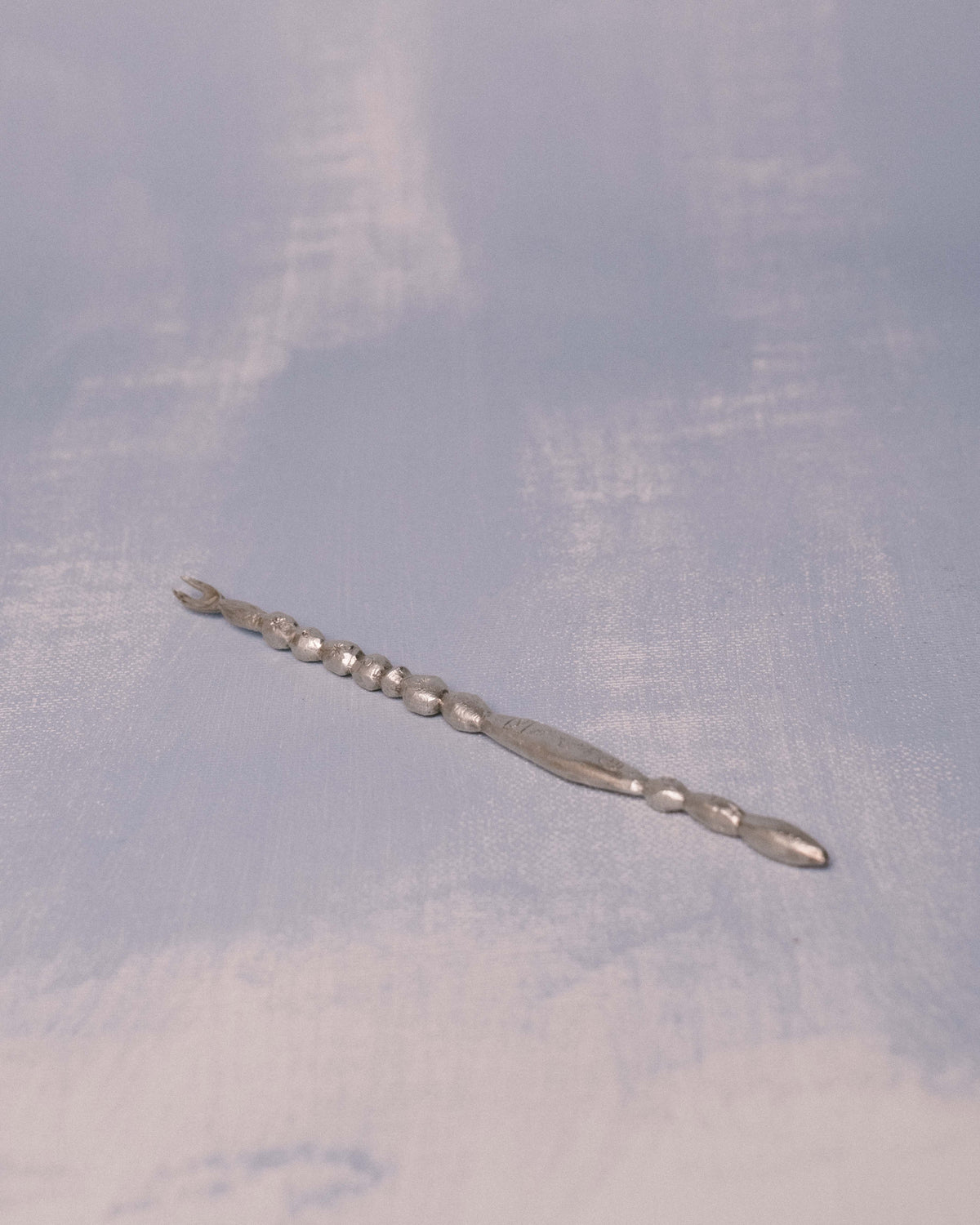 Full length of Yeodong Yun sterling silver Fork, cast with beaded form oscillating between utility and adornment