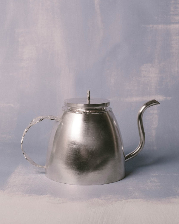 Kettle by Yeodong Yun, silver-plated copper, curved spout, front view