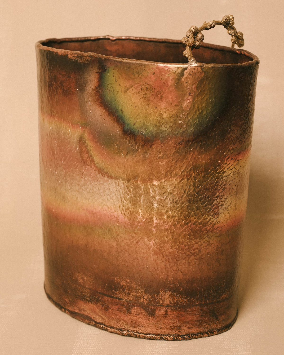 Back view of Mimosa Bucket, hand-worked copper and brass texture