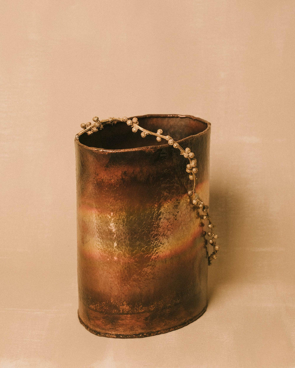 Hand-worked copper surface of Mimosa Bucket, side profile