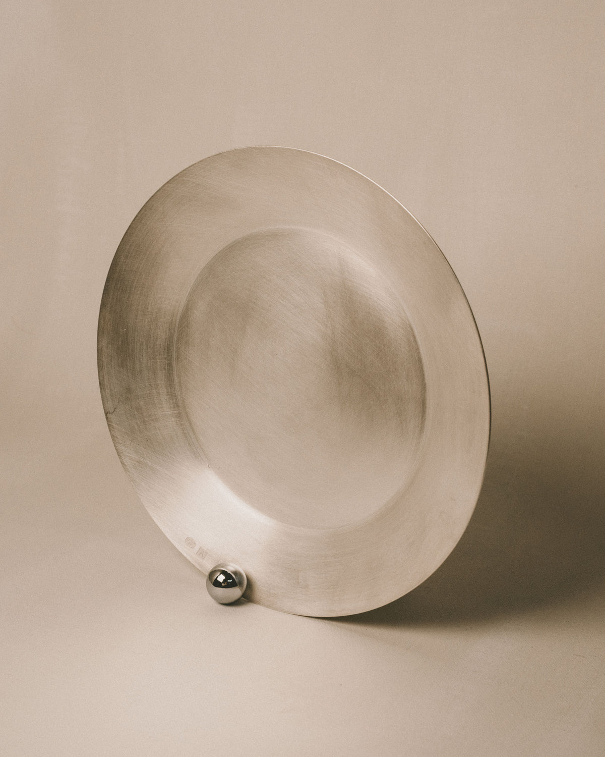 Yeodong Yun Plate 2, silver-plated copper vessel with polished sphere detail, front view showing wide open surface